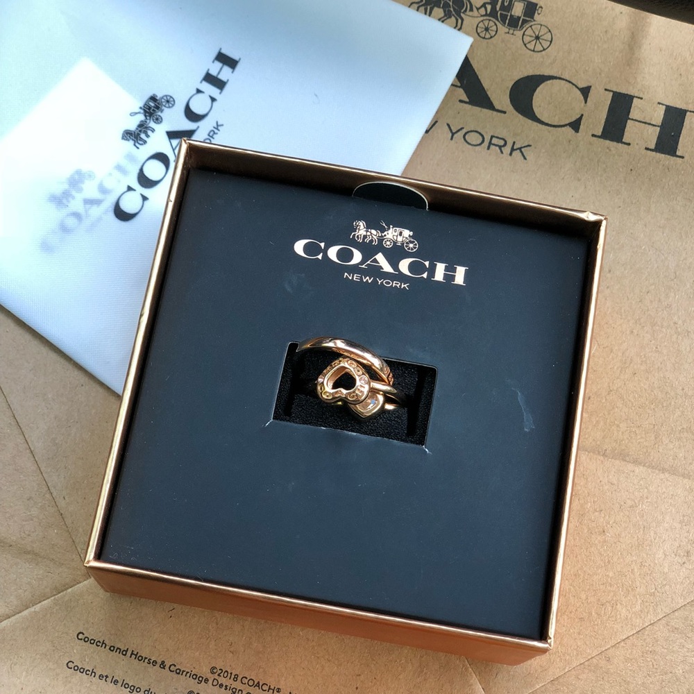 Coach set of three rose gold rings